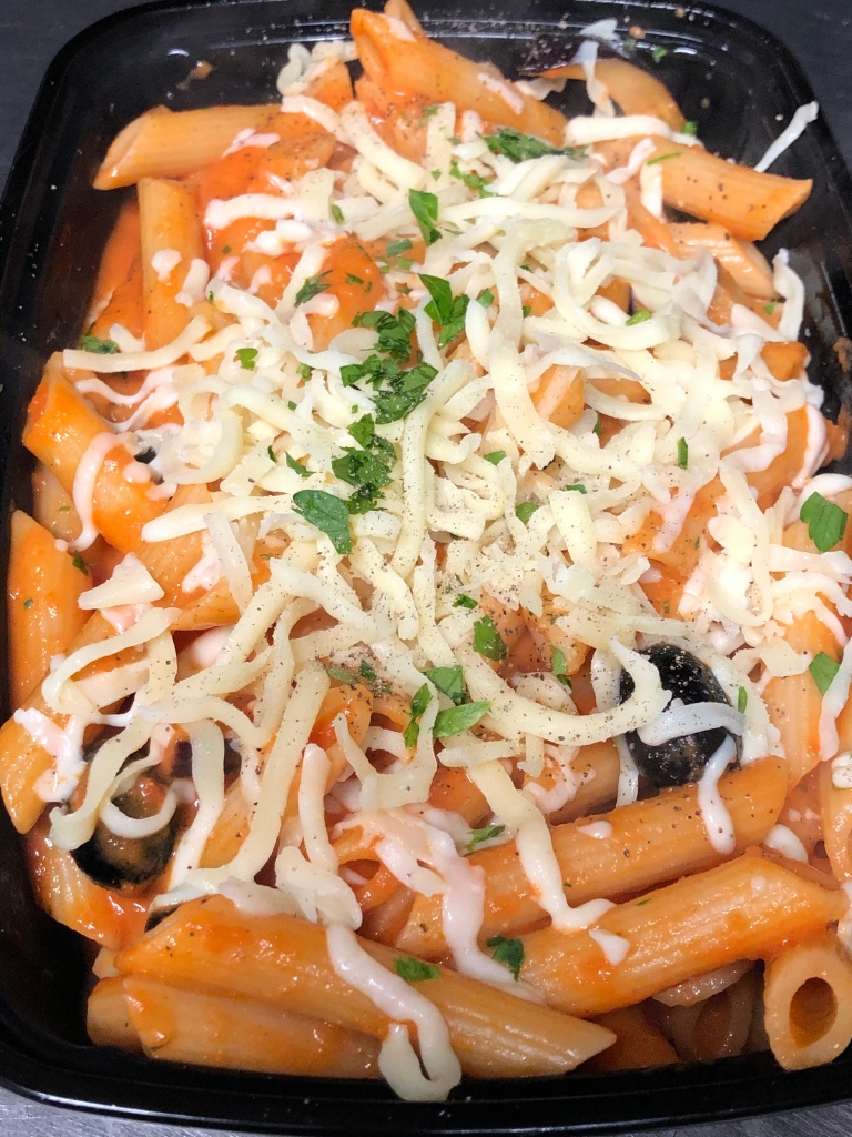 Penne Norma with aubergine, black olives in tomato and cream sauce, topped with fresh mozzarella £8.75
